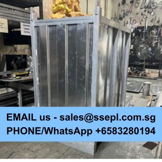 Industrial metal enclosure in a workshop with a blue banner at the bottom showing contact info: 'EMAIL us - sales@ssepl.com.sg' and 'PHONE/WhatsApp +65 83280194'.
